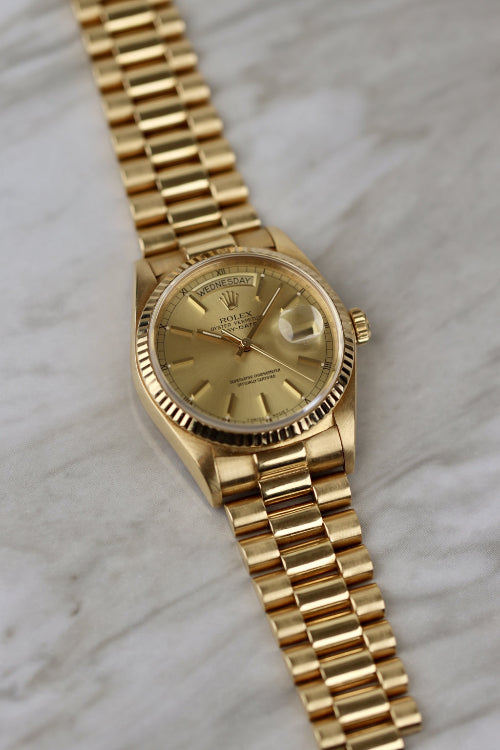 Vintage Rolex Day-Date 18038 in 18k yellow gold with English day display on President bracelet – Lazuli Vintage Watches, Zurich.