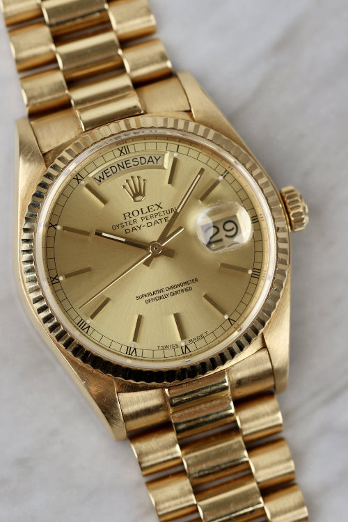 Vintage Rolex Day-Date 18038 in 18k yellow gold with English day display on President bracelet – Lazuli Vintage Watches, Zurich.
